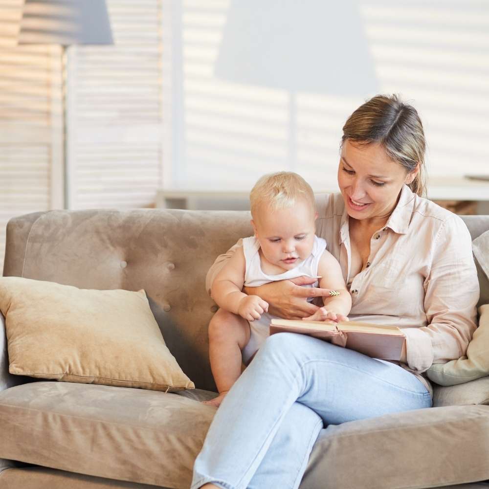 three books to read to your baby Mom reading a book to her baby using the soung of our voice or seek out our movements and expression