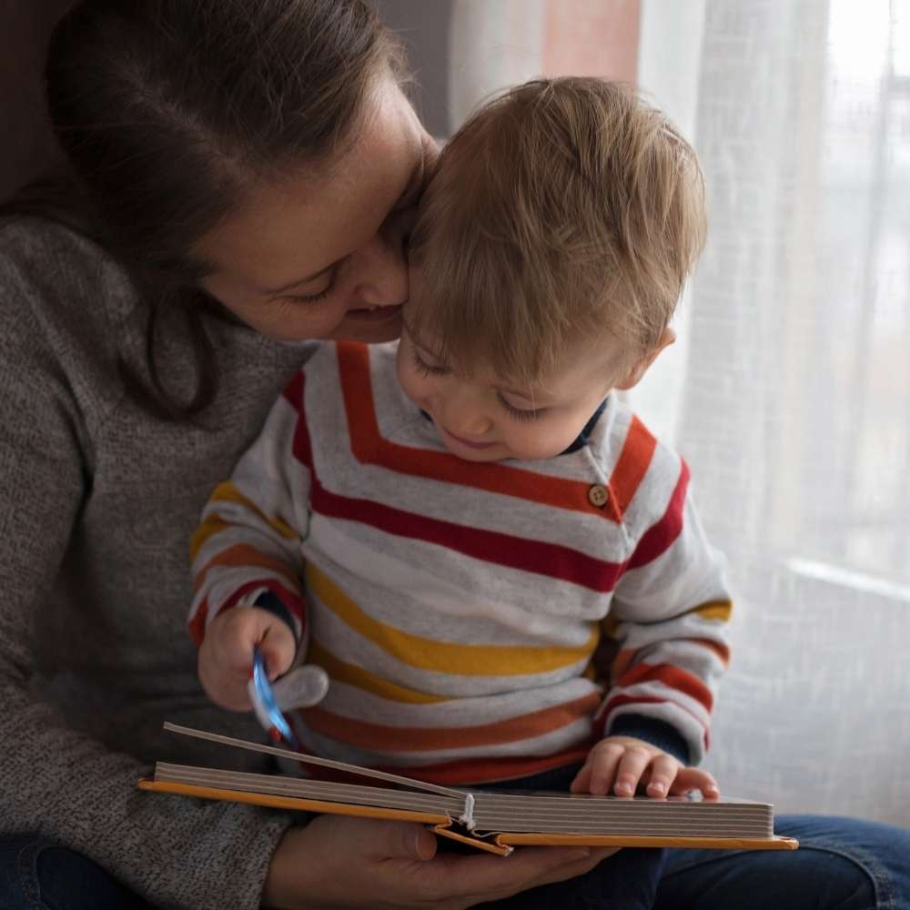 three books to read to your baby Mom reading a book to her baby favourite books that we've grown to love