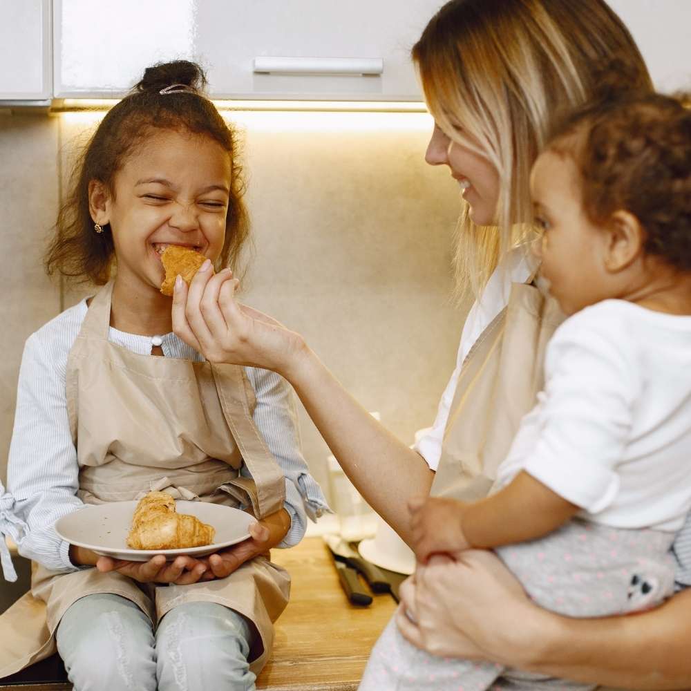 Family cooking together to explore cultural taste