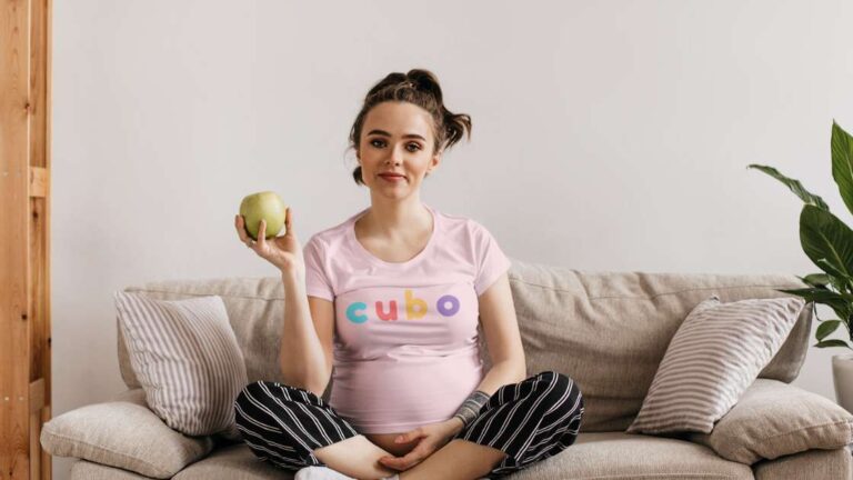 cubo toys pregnant woman couch apple landscape image