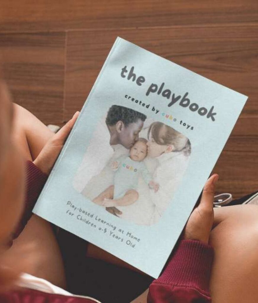 Parent and child taking a free personality quiz about play styles on a tablet